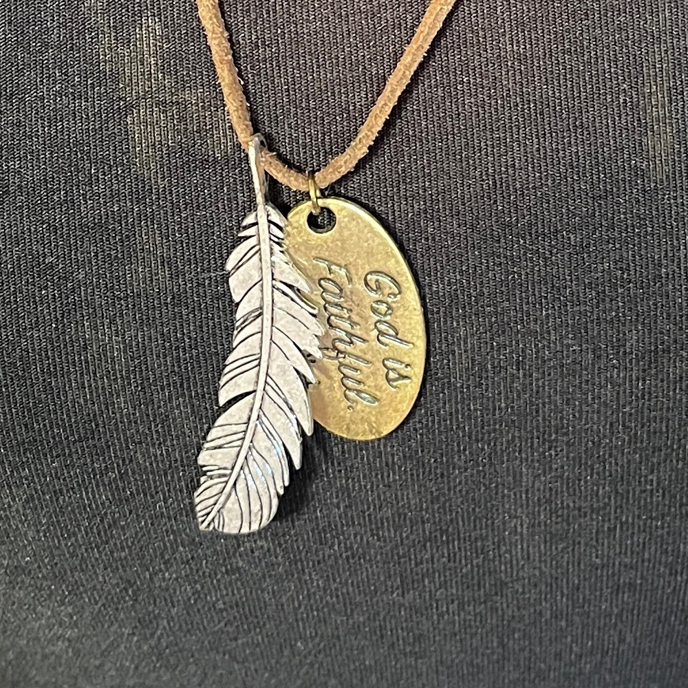 Leather Necklace with feather pendant and oval pendant that says God is Faithful